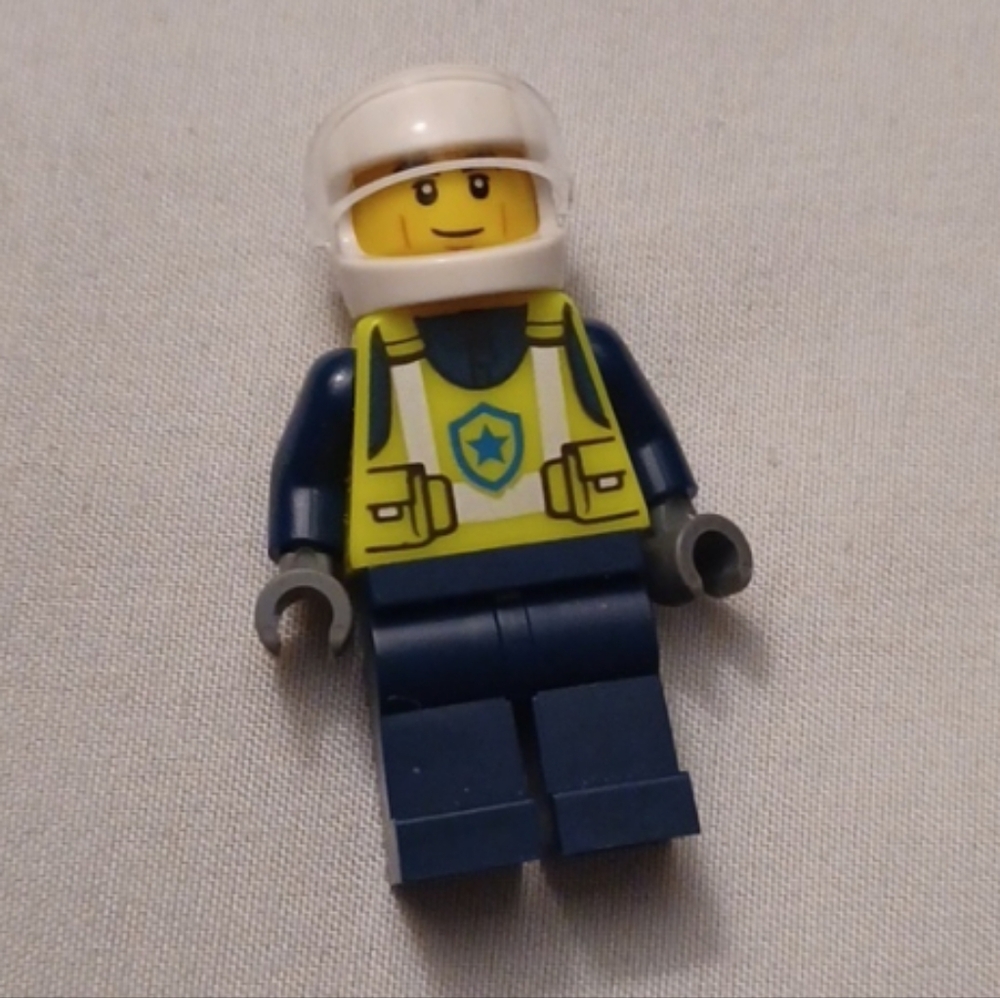 4/$80 LEGO City Male Police Officer Minifigure in Dark Blue & Yellow Vest